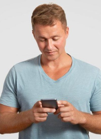 man-holds-modern-smart-phone-texts-messages-checks-his-email-box-connected-wireless-internet_176532-9527
